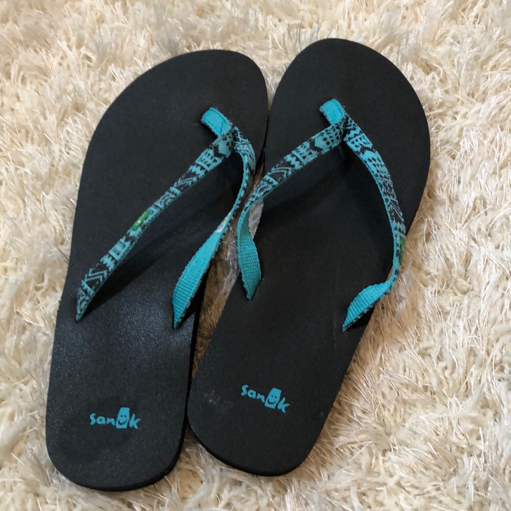 Women’s Sanuk flip flops size 9